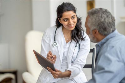 Doctor speaking with a patient